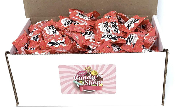 Open box filled with red individually wrapped Zotz Strawberry fizz candies