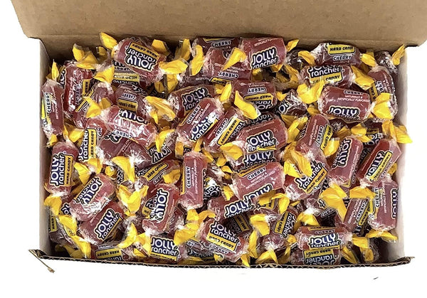 Top view of open box packed with individually wrapped Jolly Rancher Cherry hard candy