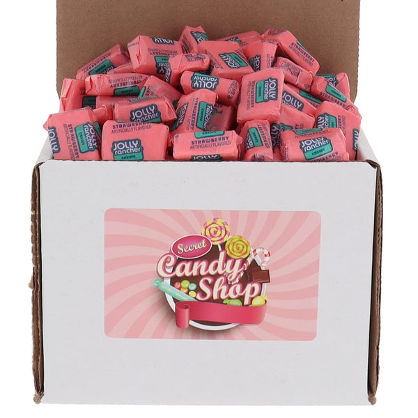 Box filled with Jolly Rancher Chews in pink strawberry flavor wrappers